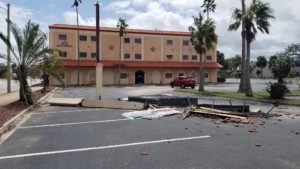 1900 Building Sign Hurricane Damage